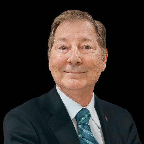 Professional headshot of ophthalmologist Dr. Michael Campion, wearing a dark suit and patterned tie, smiling in front of a neutral background.
