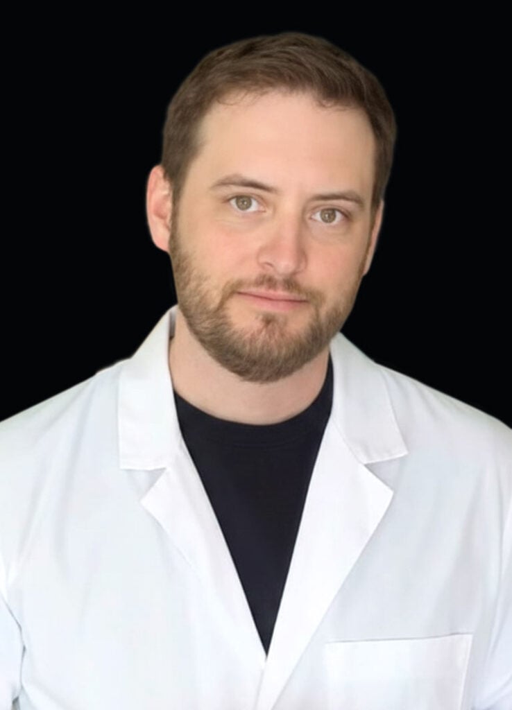 Headshot of Dr. Brian Petracca, OD in a white coat.