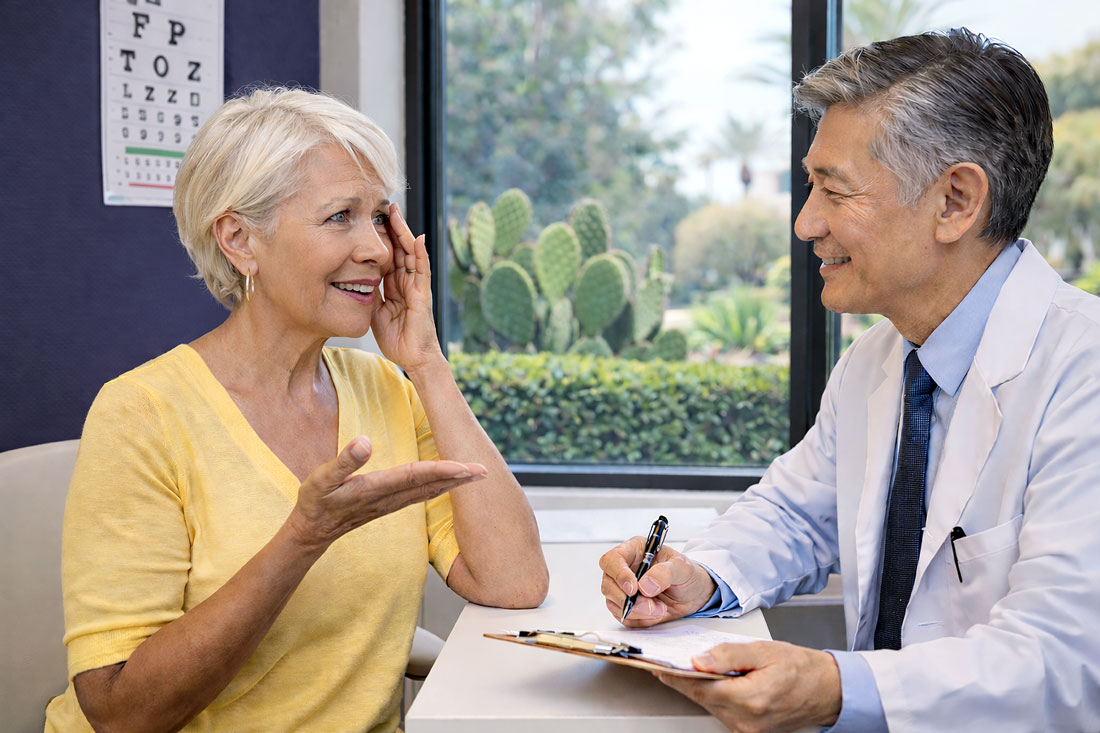 Doctor talking to patient in consultation about MIGS.