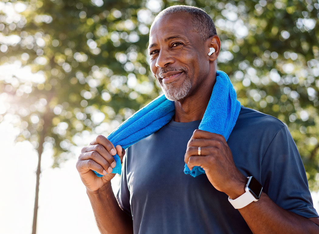 Elderly man excercising at the park after Minimally Invasive Glaucoma Surgery at Southwestern Eye Center