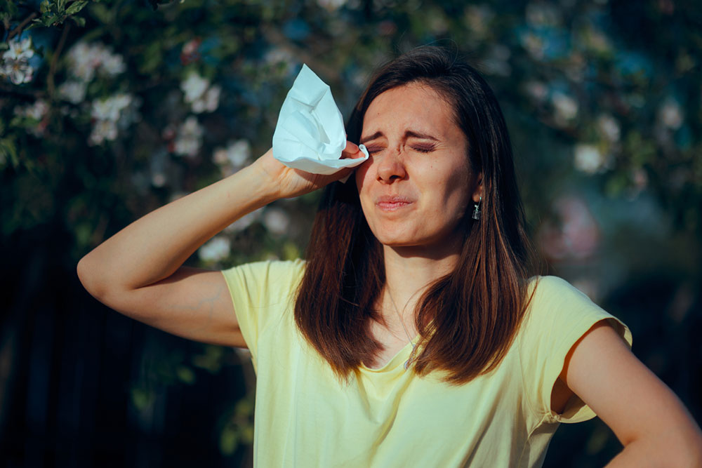 Woman with extremely bad ocular allergies in Arizona.