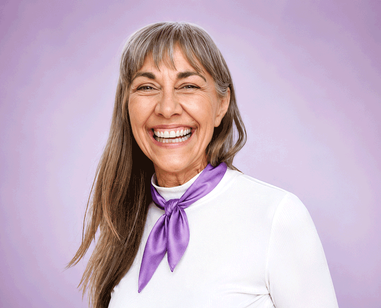 Senior woman happy after learning about early-onset cataracts from Southwestern Eye Center.
