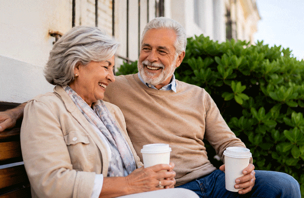 Senior couple enjoying coffee after learning does Medicare cover cataract surgery at Southwestern Eye Center.