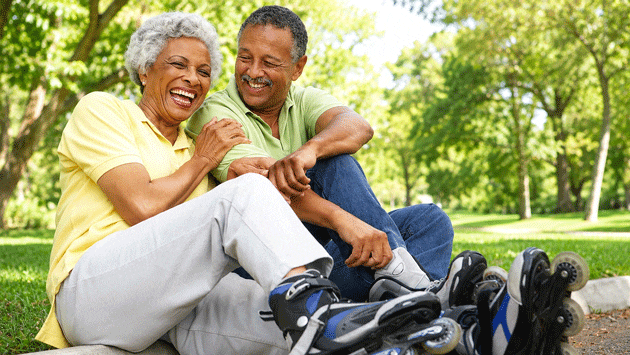 A senior couple skating in the park after going through the cataract surgery process at Southwestern Eye Center.