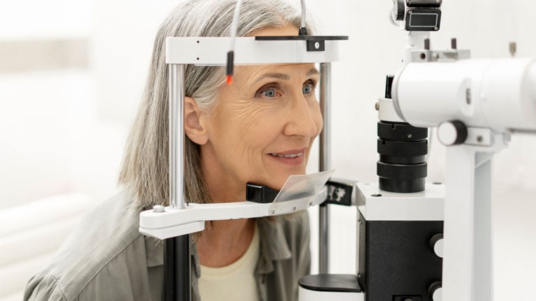 Image of a senior woman having tests to prepare for cataract surgery